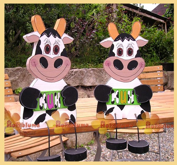 sitzende Kuh aus Holz